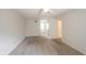 Spacious bedroom with neutral carpet and access to walk-in closet at 6028 Thornwood Ct, Indianapolis, IN 46250