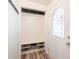 Entryway featuring built-in storage, hooks, and stylish flooring at 6028 Thornwood Ct, Indianapolis, IN 46250