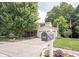 Exterior view showcasing the home's facade, driveway, and well-maintained landscaping at 6028 Thornwood Ct, Indianapolis, IN 46250