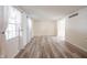 Spacious living room with large windows and attractive flooring at 6028 Thornwood Ct, Indianapolis, IN 46250