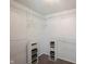 Walk-in closet with shelving units and storage baskets at 6028 Thornwood Ct, Indianapolis, IN 46250