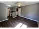 Bedroom featuring luxury vinyl flooring and two closets at 6238 E Southport Rd, Indianapolis, IN 46237