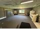 Finished garage with laundry, utility sink and shop area at 6238 E Southport Rd, Indianapolis, IN 46237