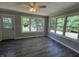 Sun Room with luxury vinyl flooring and multiple windows allowing for tons of natural light at 6238 E Southport Rd, Indianapolis, IN 46237