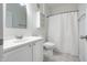 Clean bathroom featuring a vanity, mirror, and shower with a curtain at 6592 Reserve Dr, Indianapolis, IN 46220