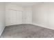Bedroom featuring carpet flooring, two closets, and neutral colored walls at 6592 Reserve Dr, Indianapolis, IN 46220