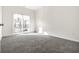 Bedroom featuring a sliding door to the balcony with carpet flooring at 6592 Reserve Dr, Indianapolis, IN 46220