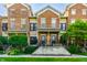 Charming brick townhouses with a manicured lawn and inviting entrance at 6592 Reserve Dr, Indianapolis, IN 46220