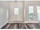 Bright foyer with a tiled entry and wood-look flooring at 6592 Reserve Dr, Indianapolis, IN 46220
