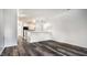 Open-concept living room with views of the kitchen and stylish flooring at 6592 Reserve Dr, Indianapolis, IN 46220
