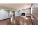 Finished basement featuring a fireplace, laminate flooring, and painted walls at 6602 S 400 W, Columbus, IN 47201