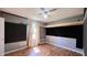 Bedroom featuring a ceiling fan and wood laminate flooring at 6602 S 400 W, Columbus, IN 47201