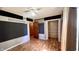 Bedroom with wood laminate floors and an open closet at 6602 S 400 W, Columbus, IN 47201
