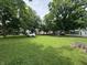 Expansive yard with lush greenery and mature trees creating a serene setting at 6895 N County Road 625 E, Brownsburg, IN 46112