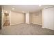 Bedroom boasts fresh paint, plush gray carpet, closet, and an open doorway at 71 E Cove Ct, Cicero, IN 46034