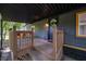 Inviting front porch with wooden railings and a 'Welcome' sign, creating a warm entrance at 71 E Cove Ct, Cicero, IN 46034