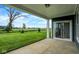 A lovely patio with a view of lush green lawn and bright blue skies at 7195 Rose Hill Ave, Brownsburg, IN 46112