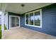 Inviting outdoor patio with large windows offering picturesque view at 7195 Rose Hill Ave, Brownsburg, IN 46112