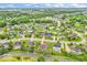 Panoramic aerial view of a neighborhood with tree-lined streets and well-maintained homes at 720 Willow Pointe North Dr, Plainfield, IN 46168