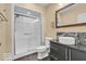 Modern bathroom with vessel sink, dark vanity, and glass-enclosed shower at 720 Willow Pointe North Dr, Plainfield, IN 46168