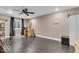 Open bonus room with wood-look tile flooring, recessed lighting, a ceiling fan, and built-in shelving at 720 Willow Pointe North Dr, Plainfield, IN 46168