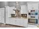 Gourmet kitchen with stainless steel appliances, granite counters, and a modern range hood at 720 Willow Pointe North Dr, Plainfield, IN 46168