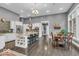 Open-concept kitchen with a large island, stainless steel appliances, and adjacent dining area at 720 Willow Pointe North Dr, Plainfield, IN 46168