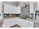 Well-appointed kitchen with granite countertops, stainless steel appliances, and a stylish backsplash at 720 Willow Pointe North Dr, Plainfield, IN 46168