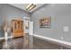 A spacious room with hardwood floors, classic cabinet, recessed lighting, and elegant trim at 720 Willow Pointe North Dr, Plainfield, IN 46168