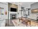 Inviting living room featuring a cozy fireplace, built-in shelving, and hardwood flooring at 720 Willow Pointe North Dr, Plainfield, IN 46168