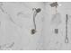 Close-up of modern walk-in shower with dual shower heads and marble tiling at 720 Willow Pointe North Dr, Plainfield, IN 46168
