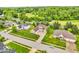 Aerial view of a beautiful neighborhood with well-maintained homes and mature trees at 720 Willow Pointe North Dr, Plainfield, IN 46168