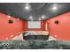 Finished basement theater room with a large screen and tiered floors for an immersive movie experience at 720 Willow Pointe North Dr, Plainfield, IN 46168