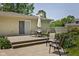 Backyard patio featuring seating, dining, and beautiful landscaping at 7401 N Layman Ave, Indianapolis, IN 46250