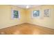 Inviting bedroom with hardwood floors, natural light, and a relaxing ambiance at 7401 N Layman Ave, Indianapolis, IN 46250