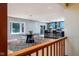 Bright dining area with modern lighting, seating for six, and open-concept flow to the kitchen at 7401 N Layman Ave, Indianapolis, IN 46250