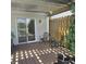 Charming back porch with outdoor furniture and access to the yard at 7608 Mather Ln, Indianapolis, IN 46239