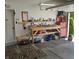 Spacious garage with ample workspace, storage, and overhead lighting at 7608 Mather Ln, Indianapolis, IN 46239