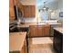 Well-lit kitchen with modern appliances, ample counter space, and a neutral color palette at 7608 Mather Ln, Indianapolis, IN 46239