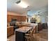 Open-concept kitchen featuring a kitchen island, stainless steel appliances, and views of the living room at 7608 Mather Ln, Indianapolis, IN 46239