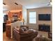 Inviting living area seamlessly connects to the kitchen, creating an open and inclusive space at 7608 Mather Ln, Indianapolis, IN 46239