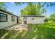 View of a house and backyard shed at 8210 Patton Dr, Lawrence, IN 46226