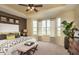 Beautiful bedroom with tray ceiling, natural light, and neutral furnishings at 8344 Leander Ave, Zionsville, IN 46077
