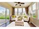 Bright sunroom features lots of light, and neutral furnishings at 8344 Leander Ave, Zionsville, IN 46077