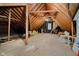 Unfinished attic space with exposed beams, offering potential for storage or conversion at 9190 Hastings Trce, Indianapolis, IN 46234