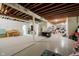 Spacious unfinished basement with exposed ceiling beams, playroom and entertainment potential at 9190 Hastings Trce, Indianapolis, IN 46234
