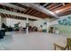 Large, unfinished basement area with exposed ceiling and colorful murals for recreation at 9190 Hastings Trce, Indianapolis, IN 46234