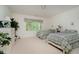 Well-lit bedroom featuring two beds, a window view, and neutral-colored decor at 9190 Hastings Trce, Indianapolis, IN 46234