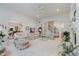 Open concept living room with ample natural light and views of the dining room and foyer at 9190 Hastings Trce, Indianapolis, IN 46234