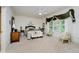 Spacious main bedroom with natural light, neutral decor, and elegant furnishings at 9190 Hastings Trce, Indianapolis, IN 46234